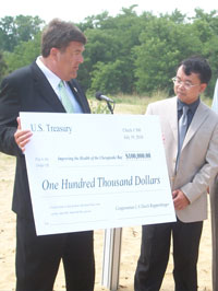Congressman Dutch Ruppersberger presents a check to Dr. Feng Chen