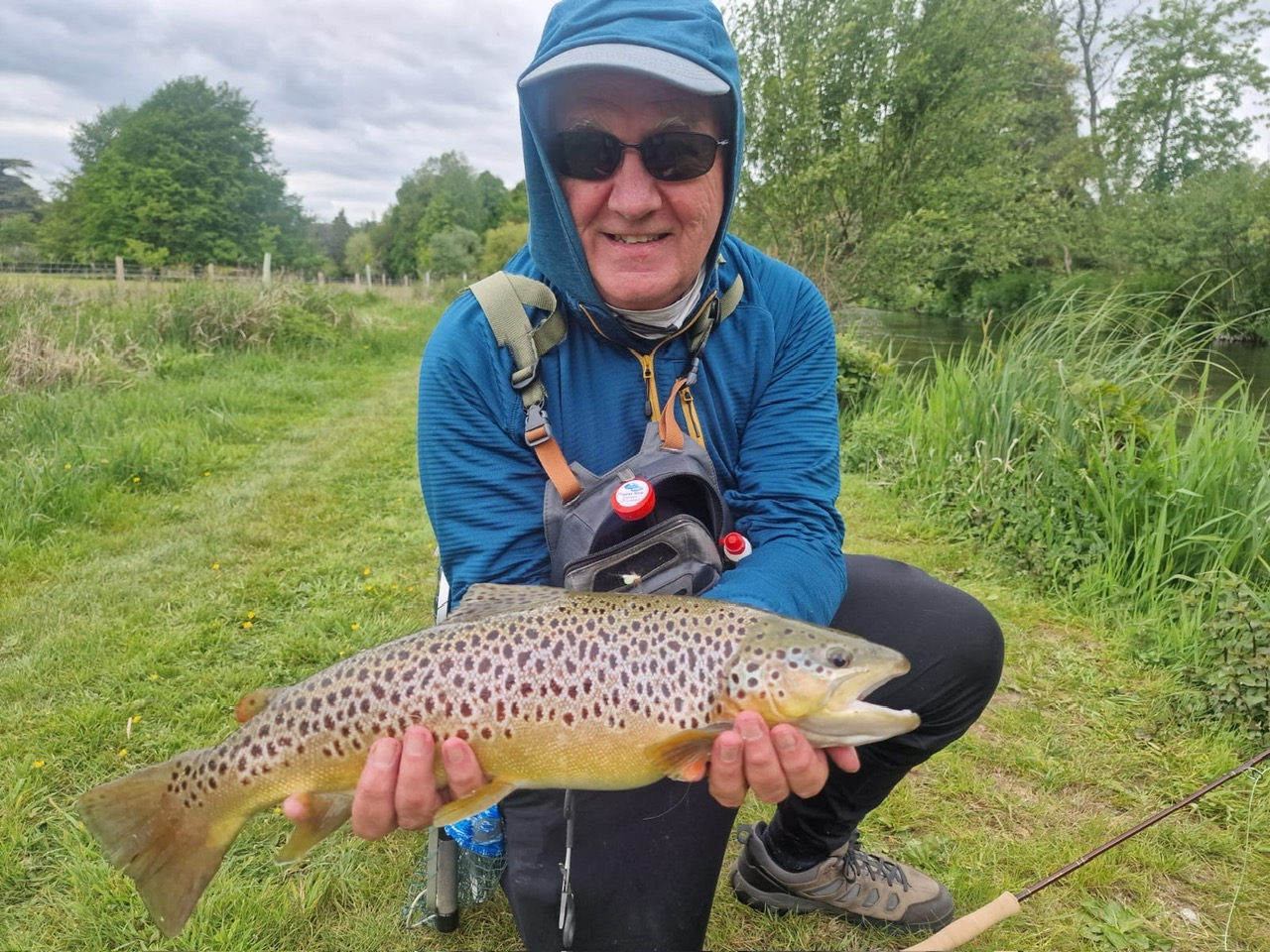 Dr. Tom Miller holds a trout