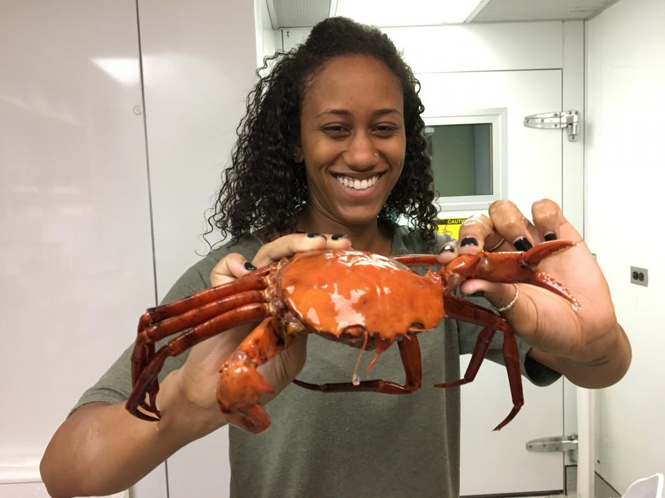 Amanda Lawrence holds a deep-sea red crab