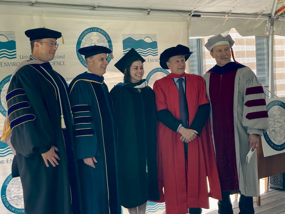 A graduate at Commencement