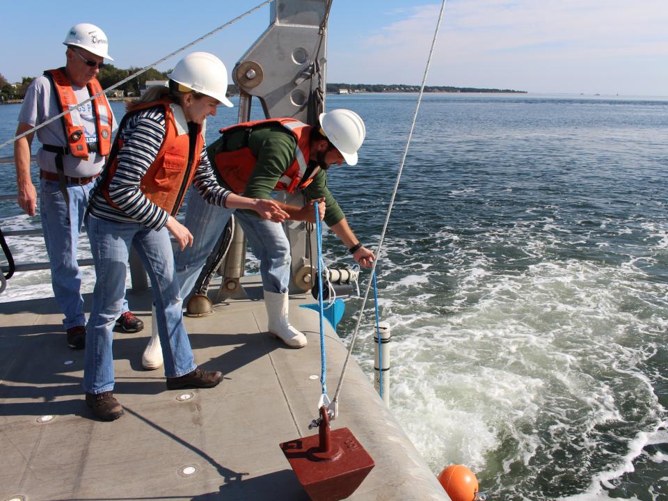 Testing water off the Rachel Carson Research Vessel