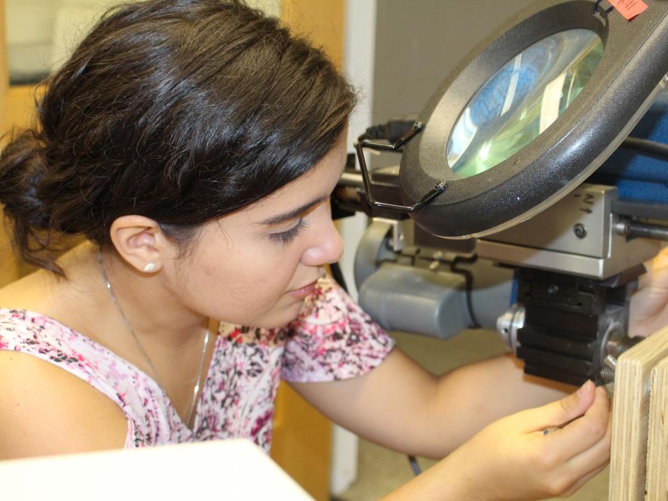 Zoraida Perez Delgado works in the lab.