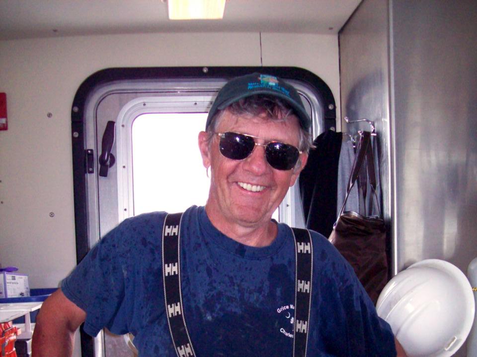 Walter Boynton, dressed for work on the Bay, poses aboard a research vessel.