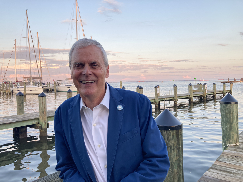 President Goodwin standing on a pier