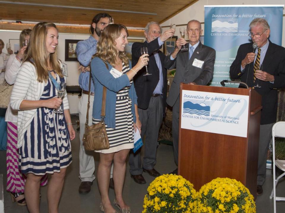 Graduate students toasting UMCES' 90th anniversary with UMCES President Don Boesch and 90th Celebration Honorary Co-Chairs Maryland Senator Bernie Fowler and The Honorable Harry Hughes.