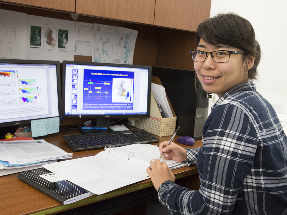 Wenfei at her desk.