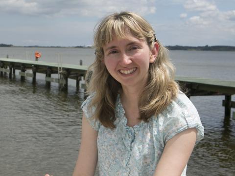 Helen Bailey poses by the CBL pier. Photo by Cheryl Nemazie