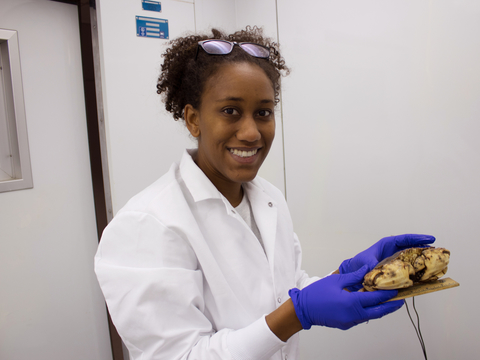 Amanda Lawrence holding a Jonah crab