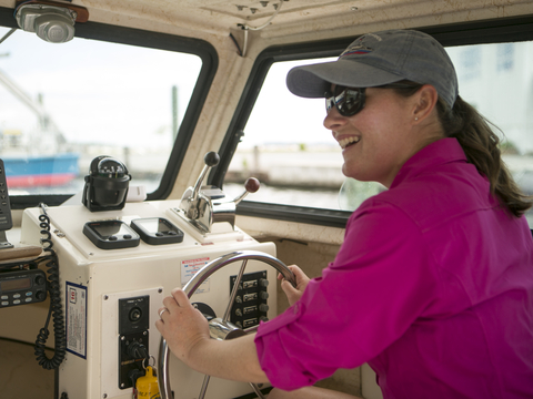 Casey Hodgkins driving boat