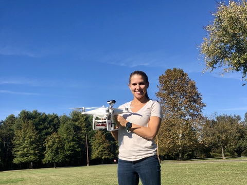 Anna Windle holding a drone