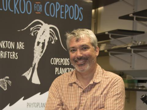 Jamie Pierson with copepod background