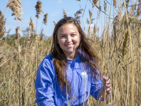 Hannah Morrissette pictured in a coastal marsh