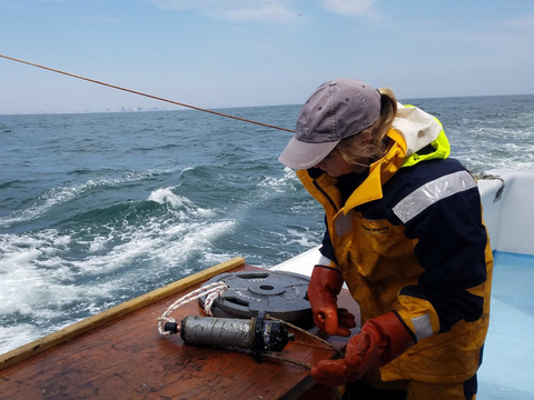 Ellie Rothermel configuring a sound receiver to be redeployed.