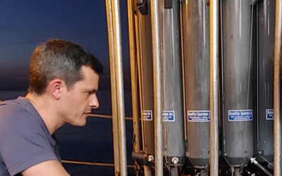 Photo of Dr. Martinez Conducting a Sampling
