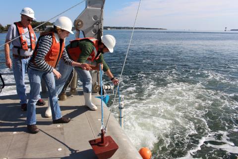 Testing water off the Rachel Carson Research Vessel
