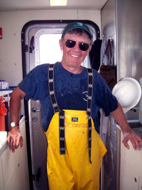 Walter Boynton, dressed for work on the Bay, poses aboard a research vessel.