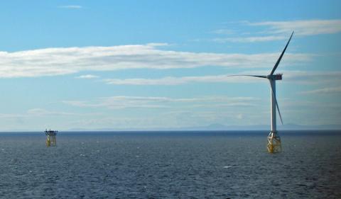 An ocean-based turbine spins on a sunny day. Photo courtesy of the University of Aberdeen.