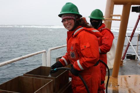 Christina Goethel hoses down benthic samples she needs for her master's research.