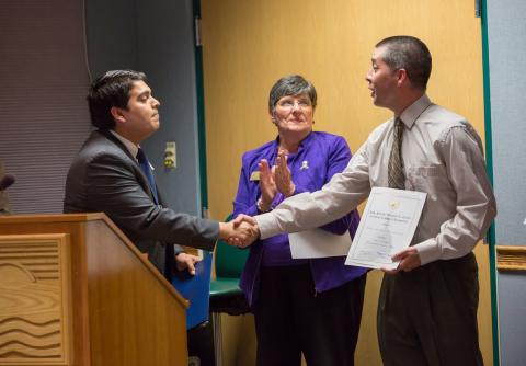 Photo of Michael Kashiwagi, DNR, receiving commendations from Senators Mikulski and Cardin and Congressman Delaney, as presented by Julianna Albowicz and Joesph Montano