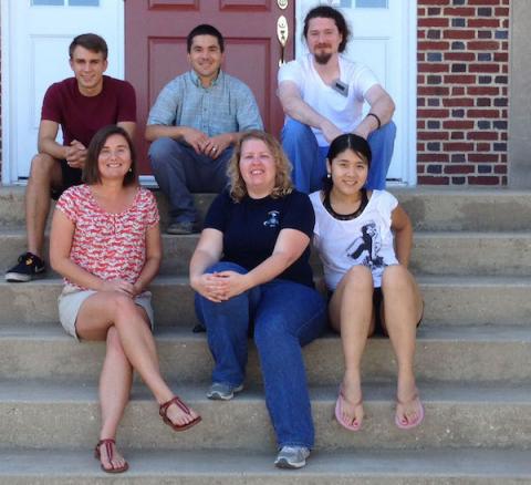 Dr. Jeremy Testa (top center) and his lab staff and students.