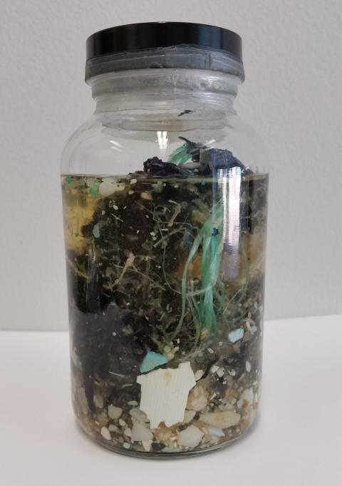 A jar shows the yield of one trawl Michael Gonsior took in the Pacific Ocean.