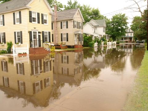 Houses surrounded by high water in Cambridge, MD by Dave Harp