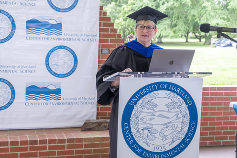 Deborah Bronk at commencement podium