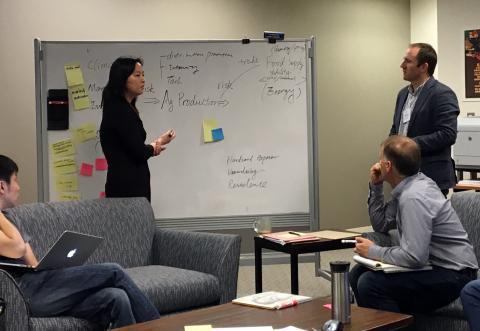 Xin Zhang leads at a sustainable agriculture matrix workshop in Annapolis