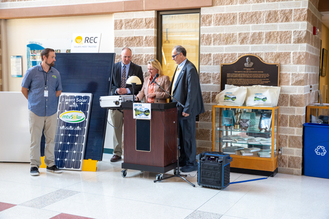 Congresswoman Delaney flips power switch for solar demonstration. UMCES President Fernando Miralles-Wilhelm is on her left, and AL Director David Nelson stands to her right. Mike Studholme stands in the foreground. 