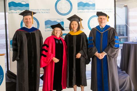 Yini Shangguan poses after commencement.