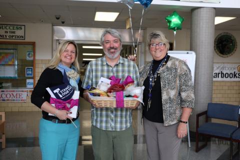 Horn Point Laboratory's Jamie Pierson (center) poses with Easton Middle School Acting Principal Jackie Valcik (left) and Superintendent Kelly Griffith. 