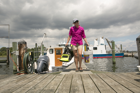 Casey Hodgkins on a dock