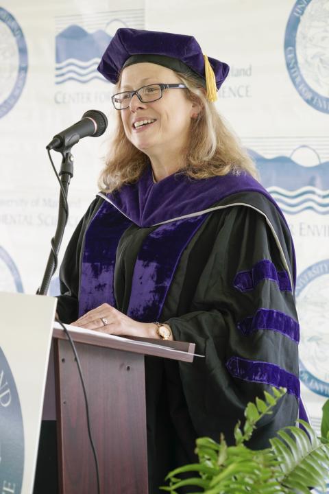 UMCES 2019 Commencement speaker Vicki Arroyo at the podium giving a speech