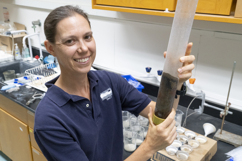 Cindy Palinkas in Lab with Soil tube sample