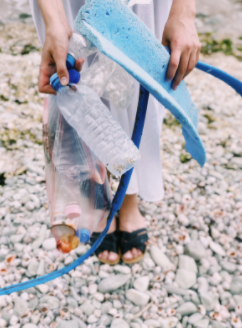 Trash found on a beach, a plastic water bottle and other plastic