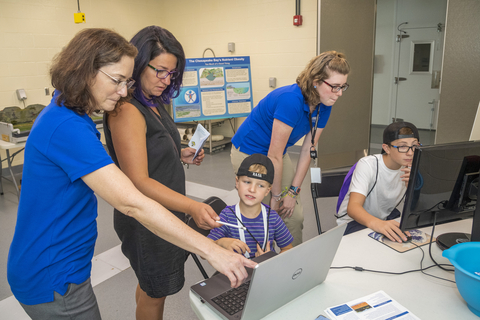 CBL volunteers teach students about science happening at UMCES at their Open House