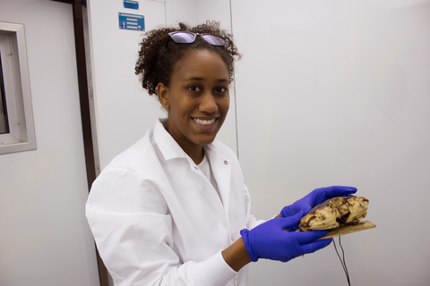 Amanda Lawrence holding a Jonah crab