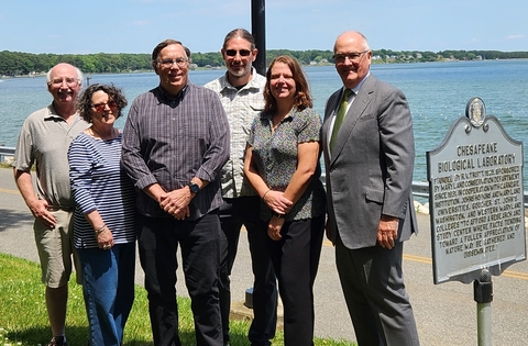 Scientists from UMCES' Chesapeake Biological Laboratory stand with Brian Hochheimer and Marjorie Wax Donors