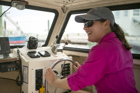 Casey Hodgkins driving boat