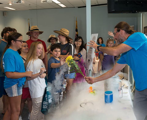 Dr. Michael Gonsior wow-ing the crowd with his liquid nitrogen experiment