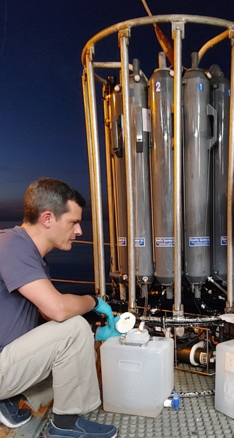 Photo of Dr. Martinez Conducting a Sampling