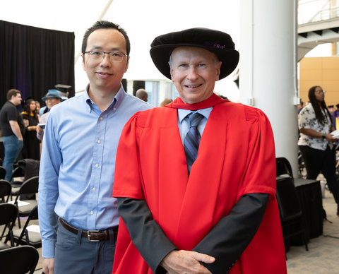 UMCES IMET Professors Yantao Lee and Russell Hill at the 2024 graduation.