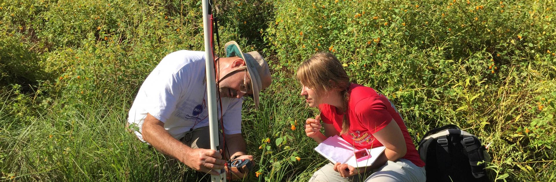 Appalachian Laboratory Professor Keith Eshleman and graduate student Stephanie Siemek observe groundwater. 