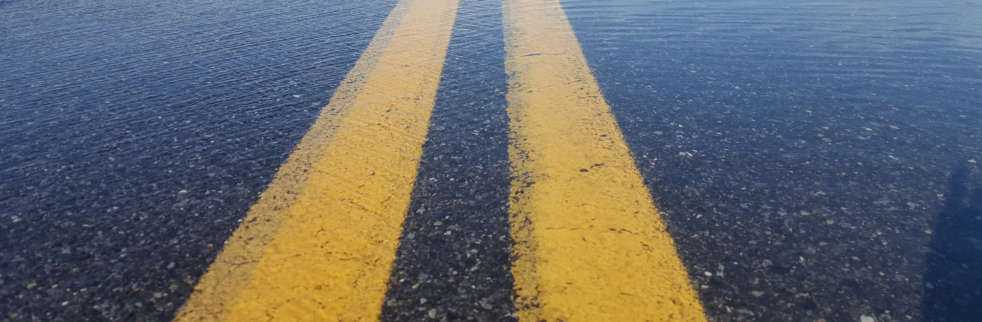 Water covers a road on the eastern shore