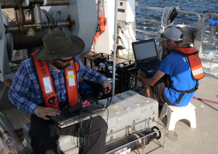 Two researchers on a research Vessel