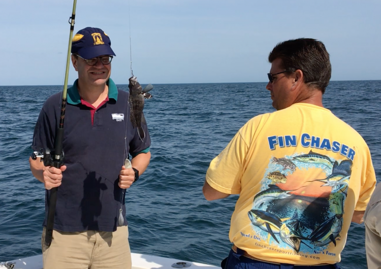 David Secor catches a black sea bass