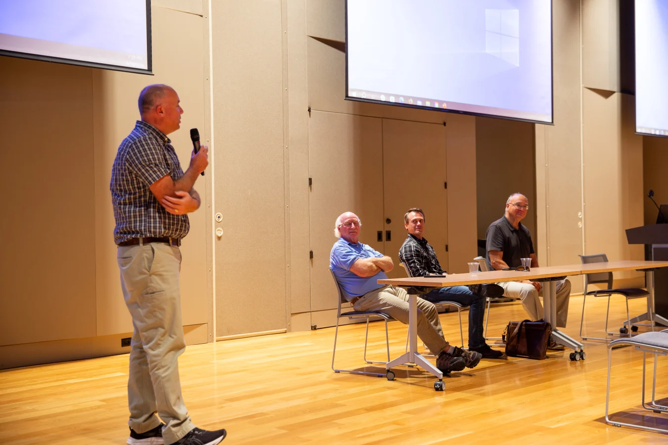 Dr. David Nelson introducing Dr. Andrew Heyes, Dr. Ryan Woodland, and Dr. Jeff Cornwell.