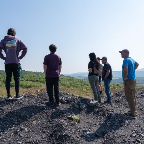 2025 Interns visiting coal mine reclamation site with Maryland Bureau of Mines staff.