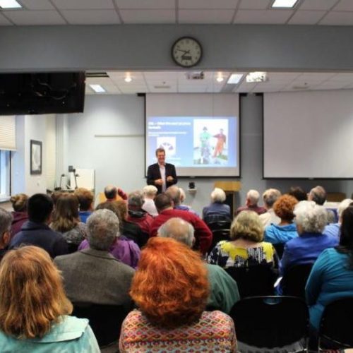 The public gathers for a science seminar