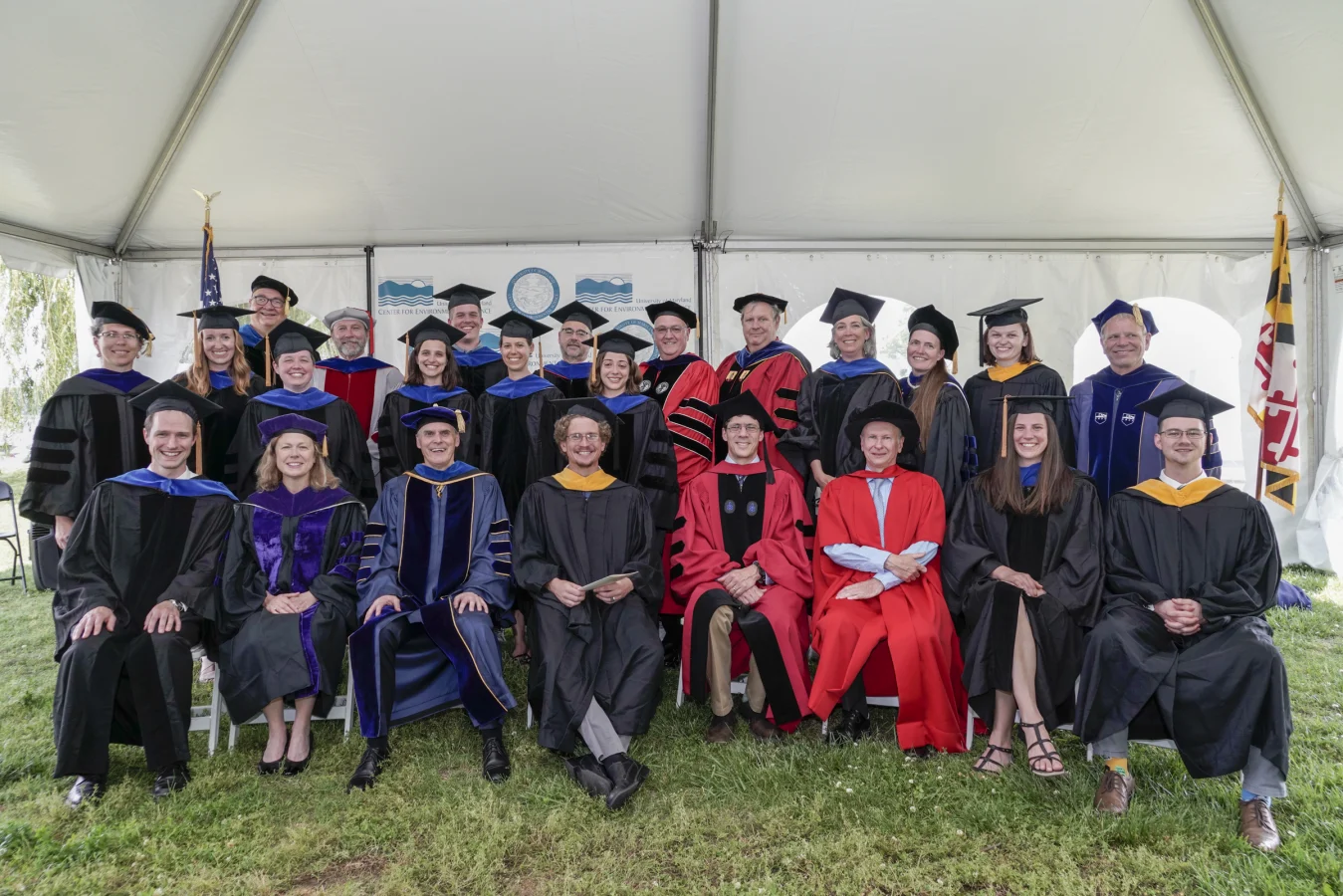 Group shot of graduates and faculty at commencement 2019